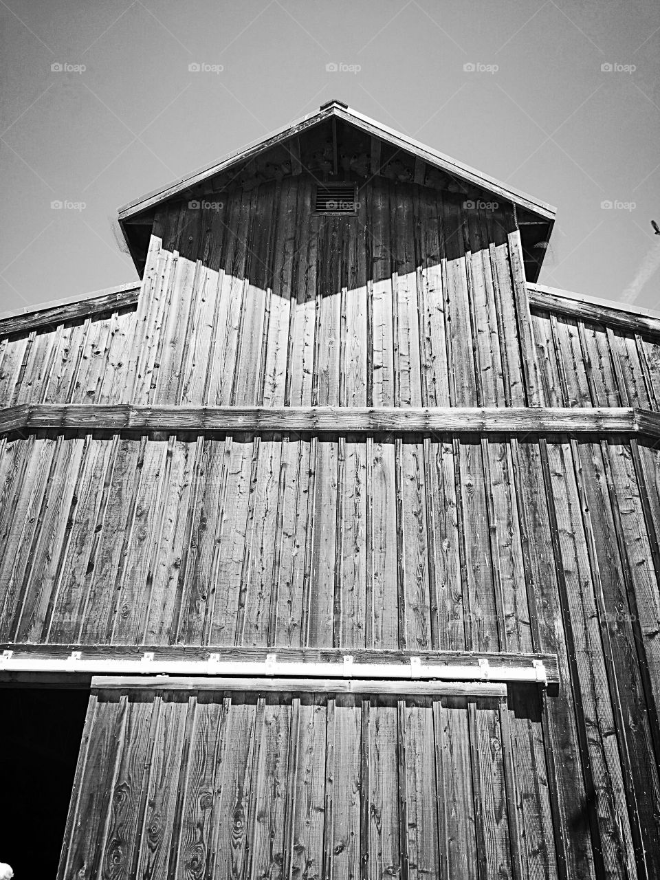 Old wooden barn . It's at least a hundred year old barn that has been pasted down from generations to generations of an adjoining family