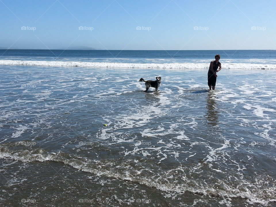 Boy and his Dog. My son and his Dog enjoying the ocean.