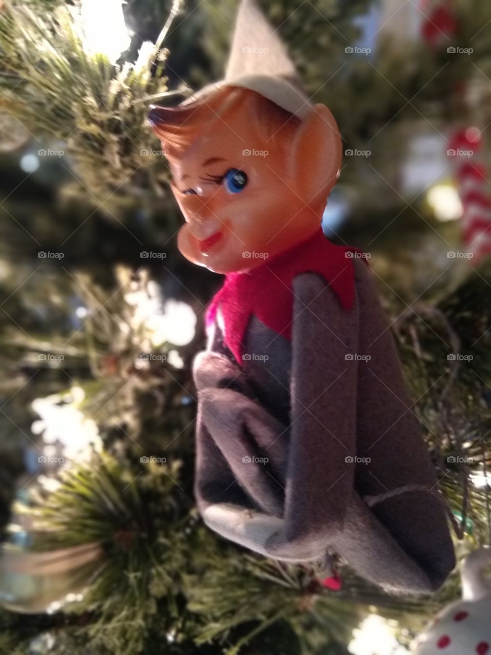 Vintage elf in the Christmas tree