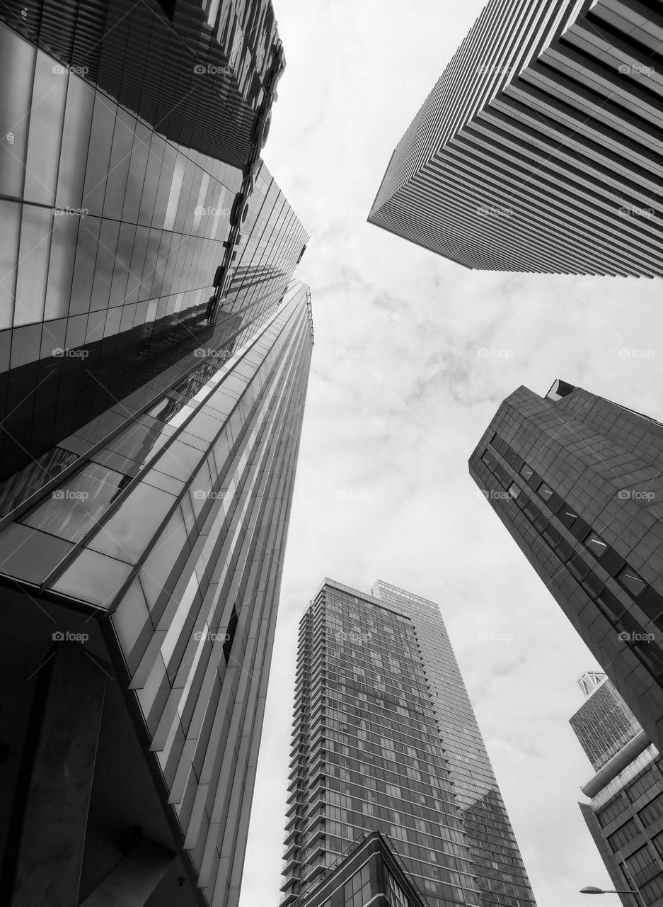 B&W photography. Skyscrapers. Street photo. Shooting from unusual angle.