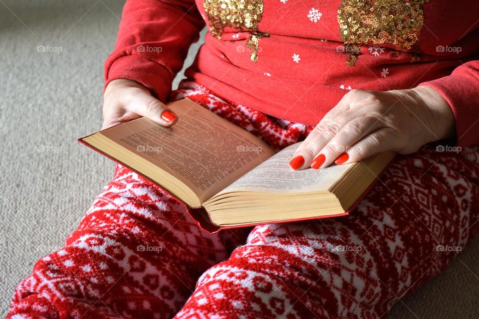 woman reading book winter time