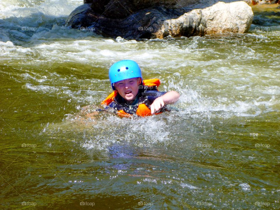 Cooling down while white water rafting in Colorado 