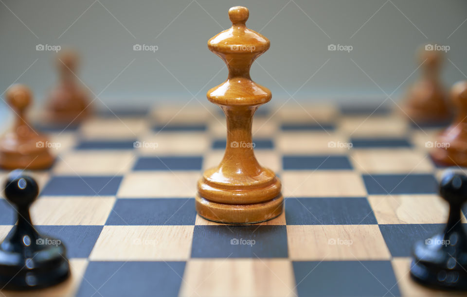 Concept chess pieces expressing social distancing