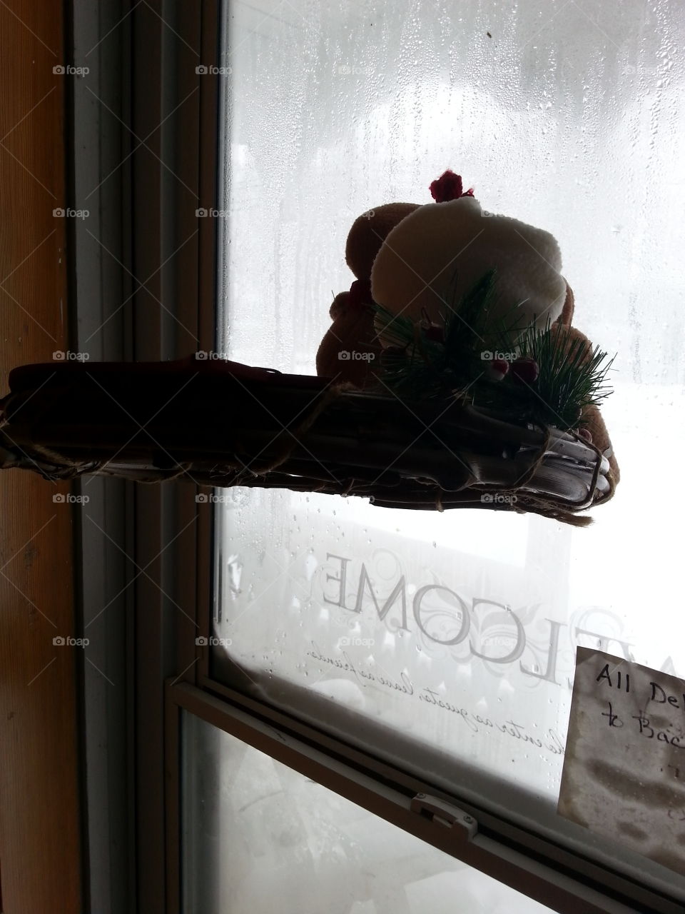 wreath frozen to front door