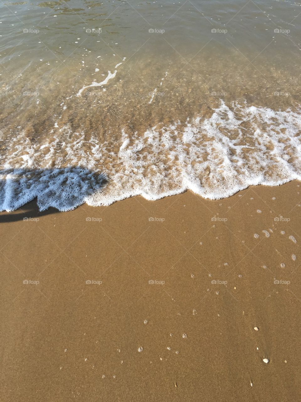 Wave and sand at The Beach in The Hague 