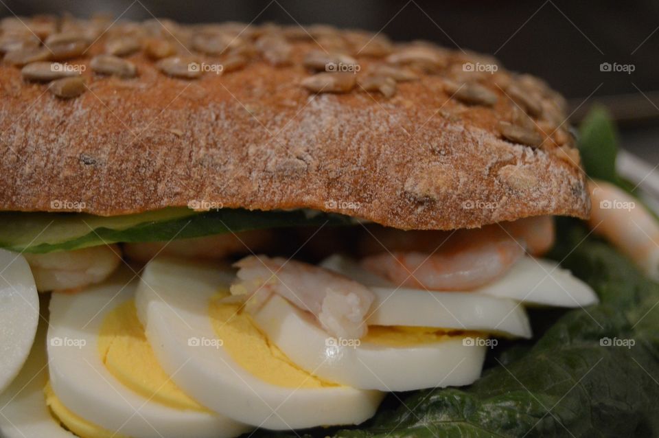 Sandwich with eggs and shrimps