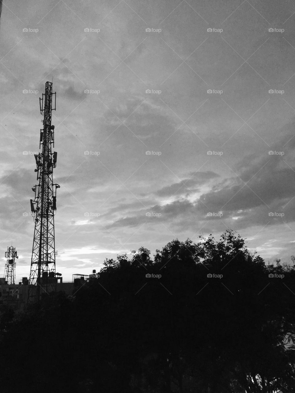 Black and white click of a simple tower nearby my house on a beautiful evening.