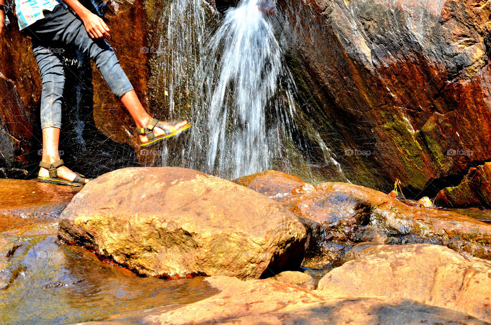 people enjoying waterfall