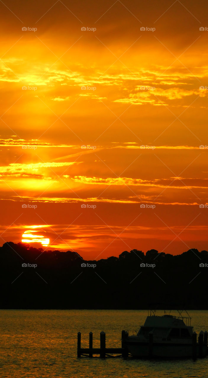 Silhouette of boat during sunset