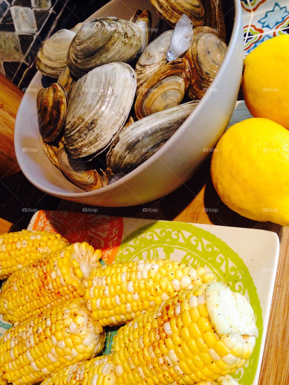 Lemon & corn bright as the sun . Fresh lemon and sweet corn are ready to compliment any seafood