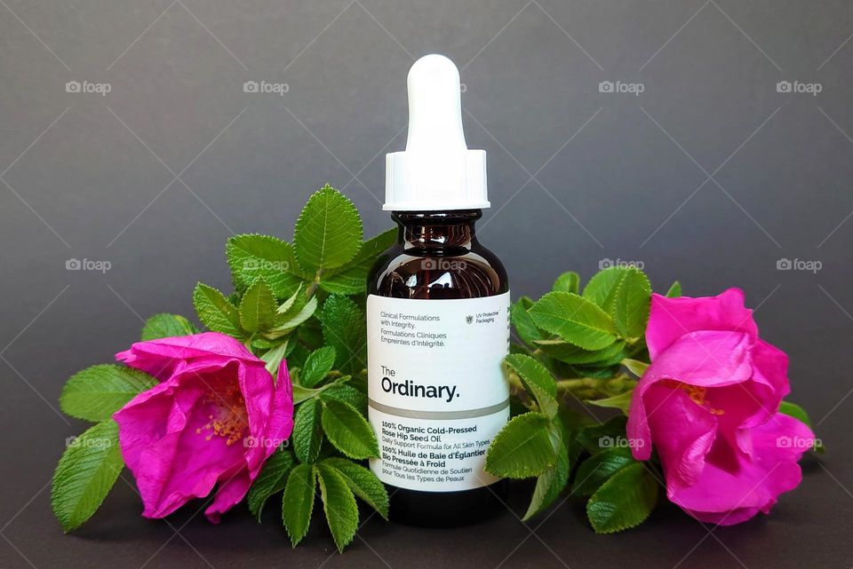 Bottle of oil with rose hip flowers🌸 The Ordinary 🌸 Organic 🌸
