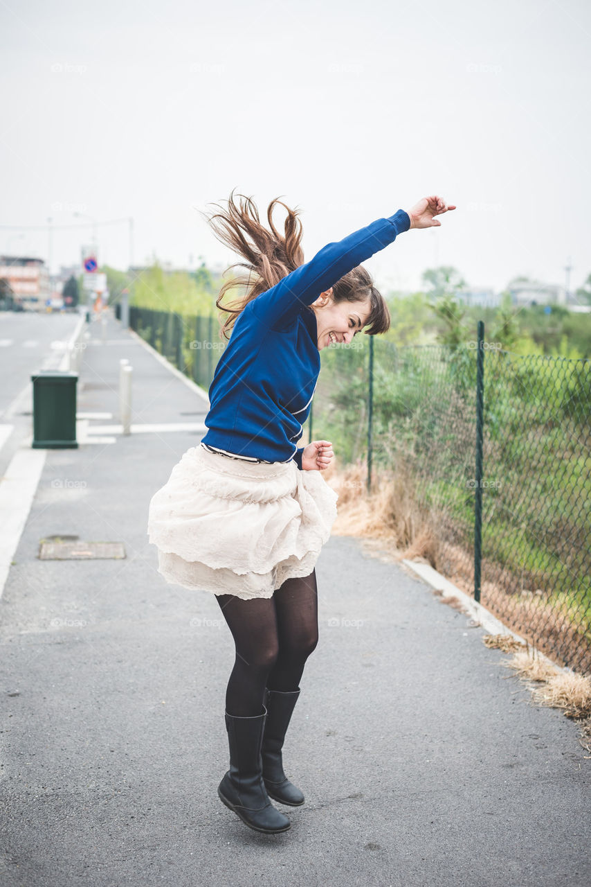 dancing woman in the city