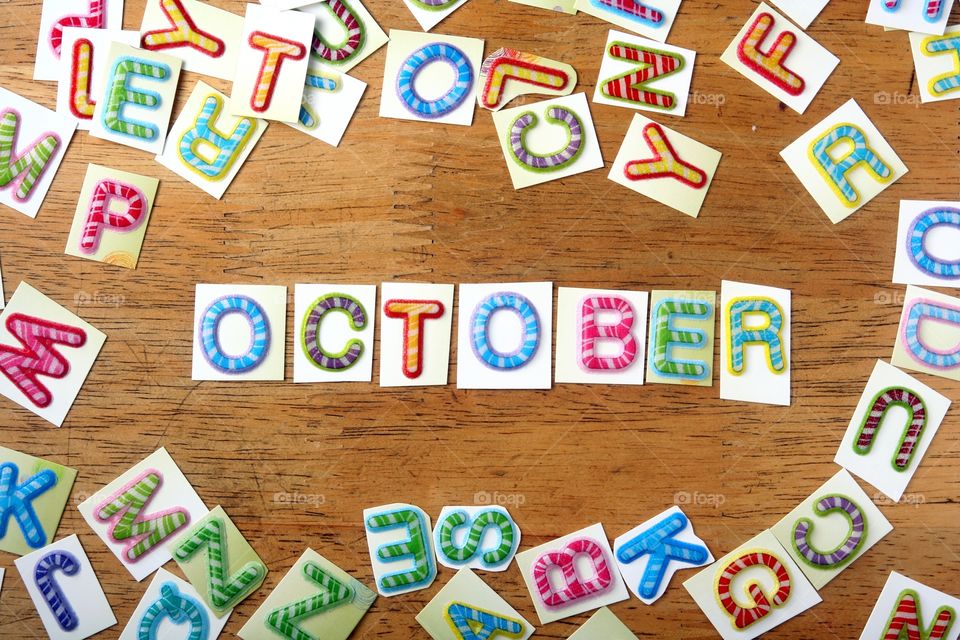 the word october. the word october spelled in colorful letters