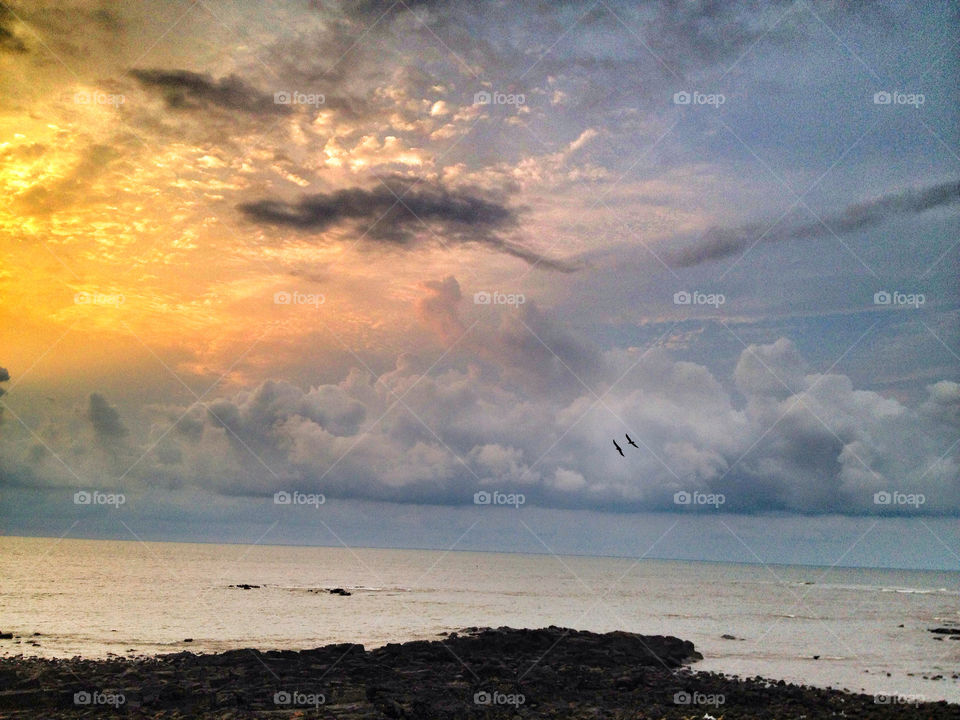 sunset clouds sea india by neenzin