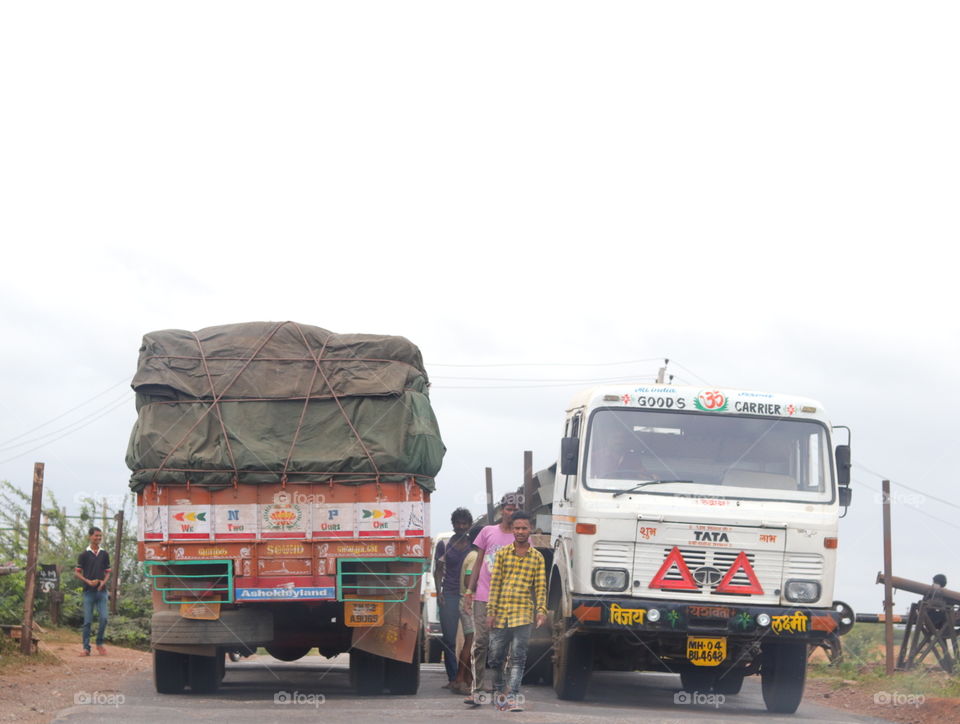 truck and people in between