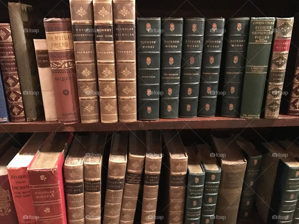 A collection of well-worn antique leather books of English literature 