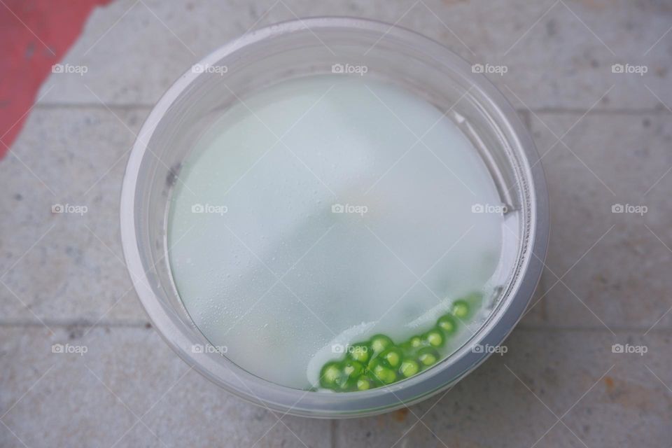 Thai dessert sago coconut milk in a cup