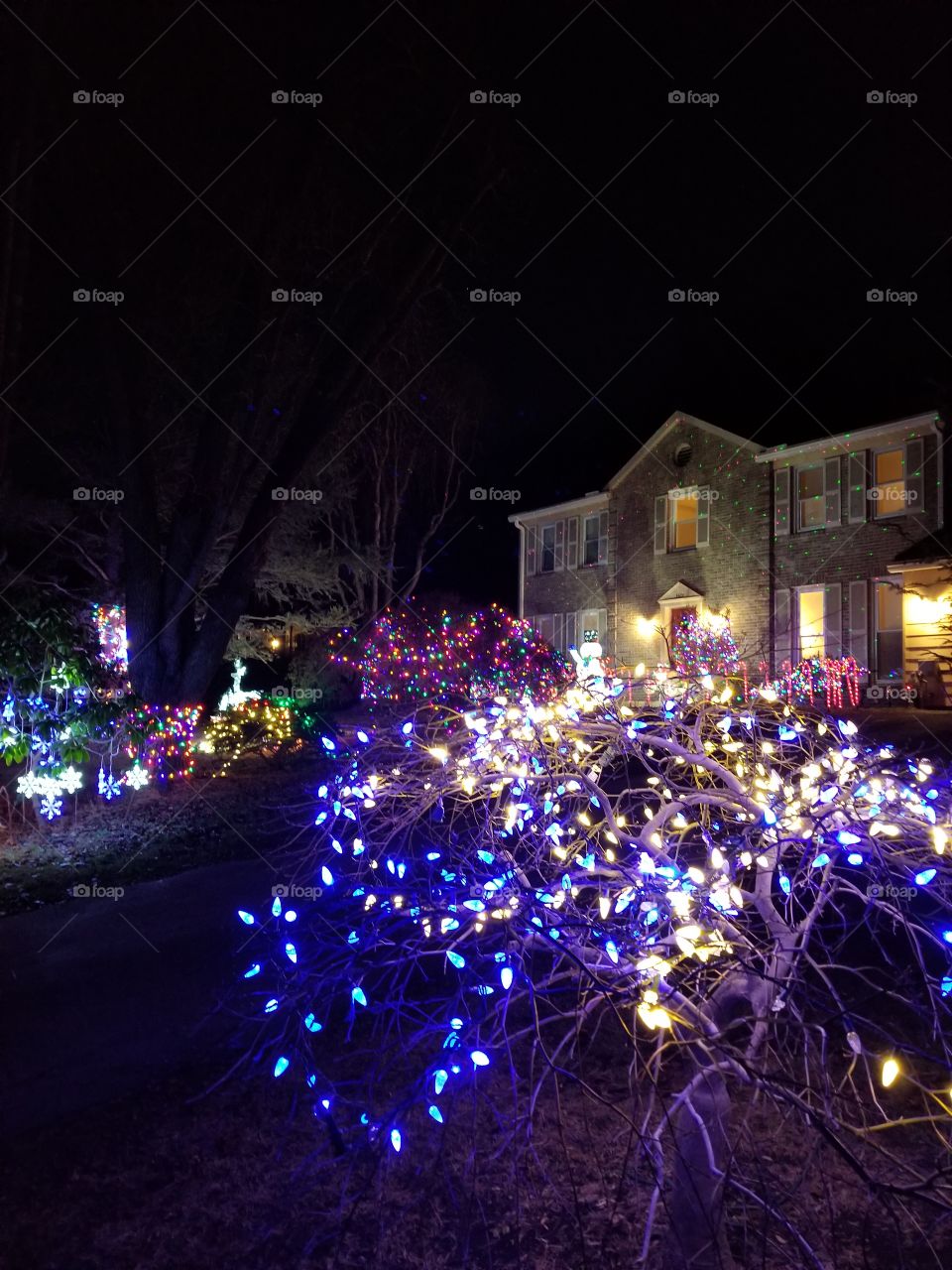 Christmas lights and decorations at night in Ellicott City, Maryland