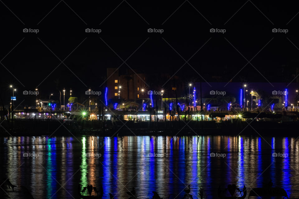 Beautiful reflection of night light on surface  of Nile river