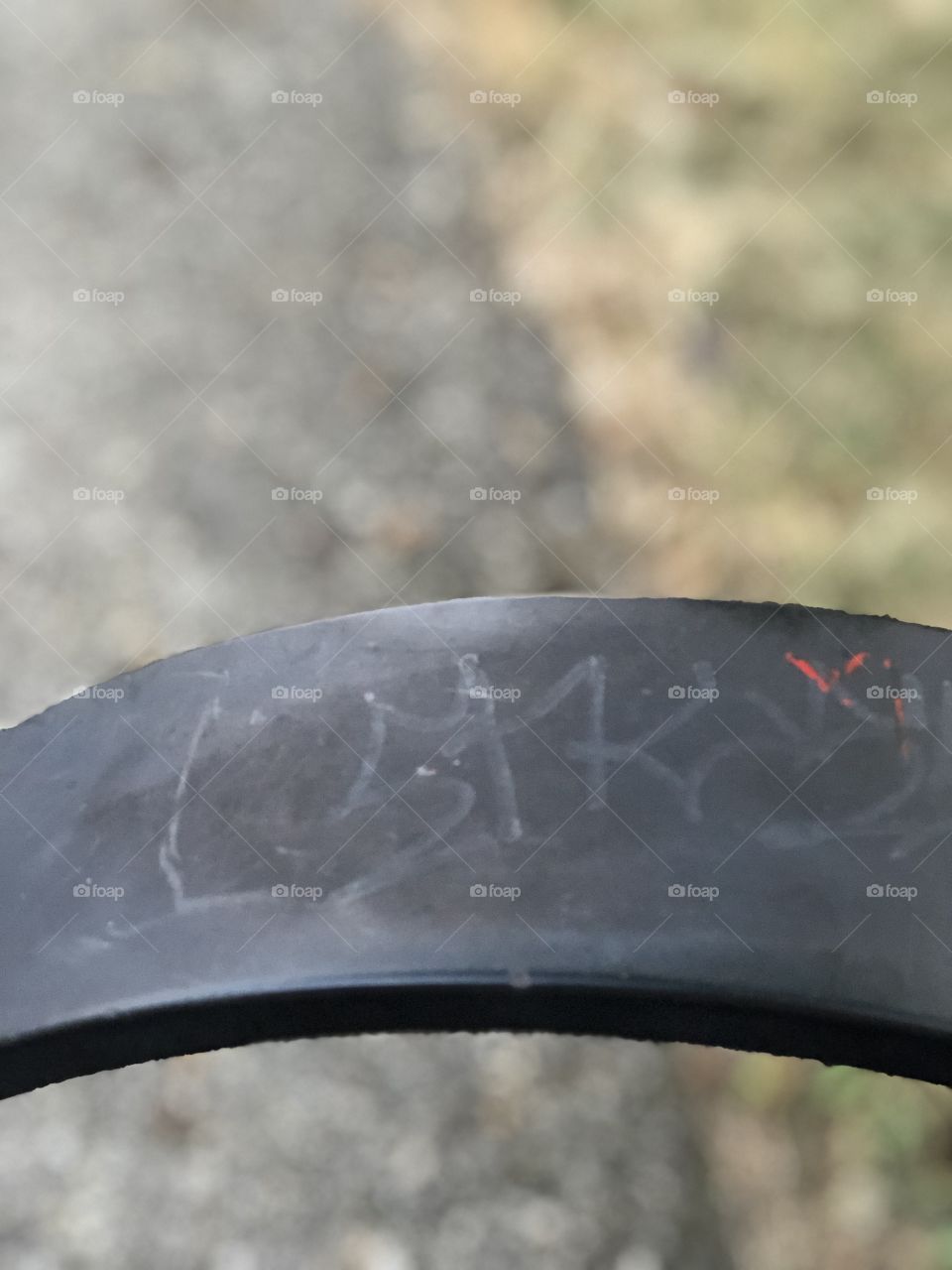 Graffiti on Bench Armrest 