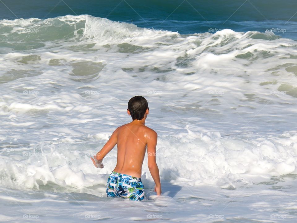 Playing in the ocean