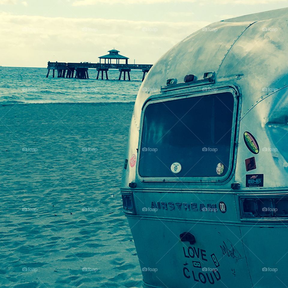 A cloudy afternoon in Deerfield Beach, Florida. This airstream trailer used to be on the beach till the city of Deerfield Beach paid millions for the land. 