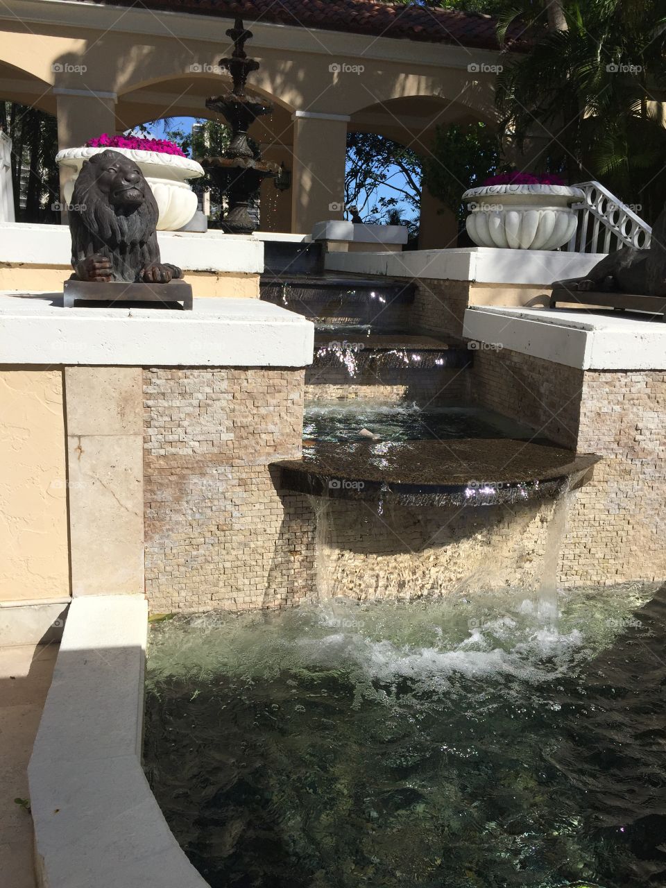 Fountain feeds the pool at The Legends golf resort Miami Florida 