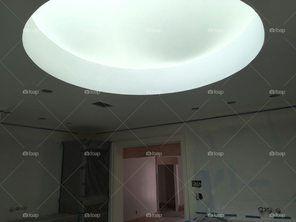 This is a picture of a round sky light that I painted in this newly renovated home in Amarillo Texas 