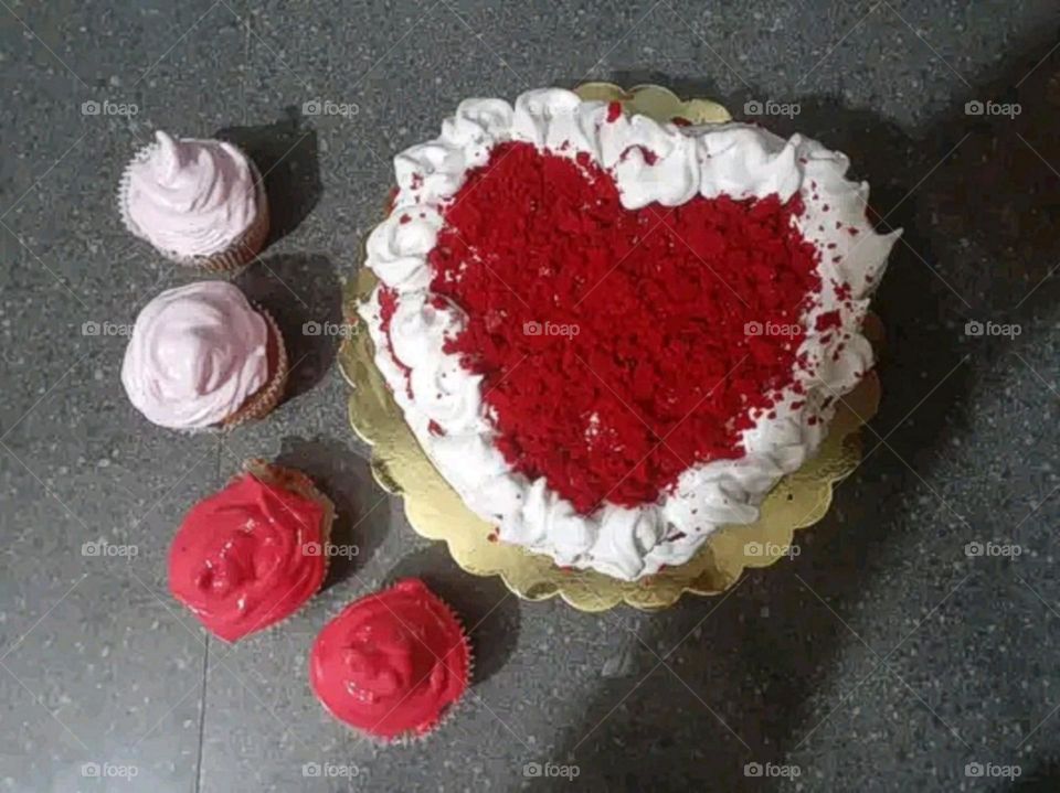 Enjoying eating ice cream at the birthday party.