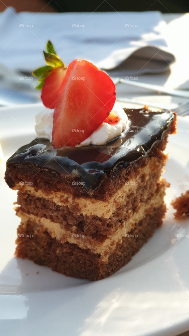 Allowing myself to have a delicious chocolate cake at the restaurant 