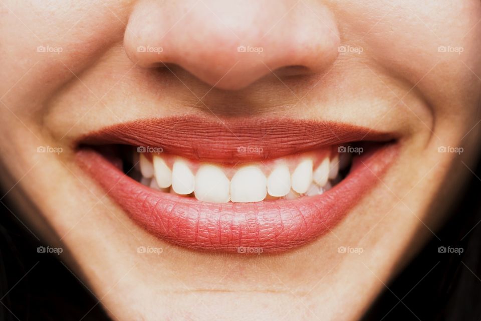 Teeth smile of young woman, close up, happy people