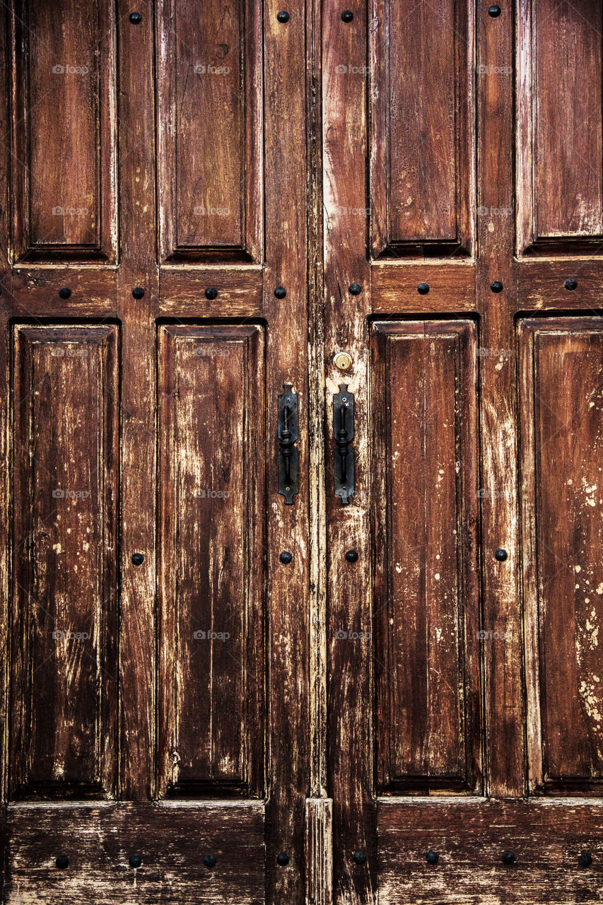 Closed doors of an old church in Copan Ruinas, Honduras.
