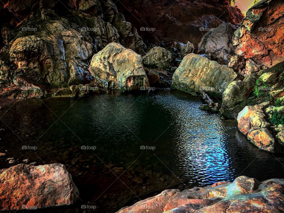 Pool of water underneath the Tonto National Bridge in Payson, Arizona