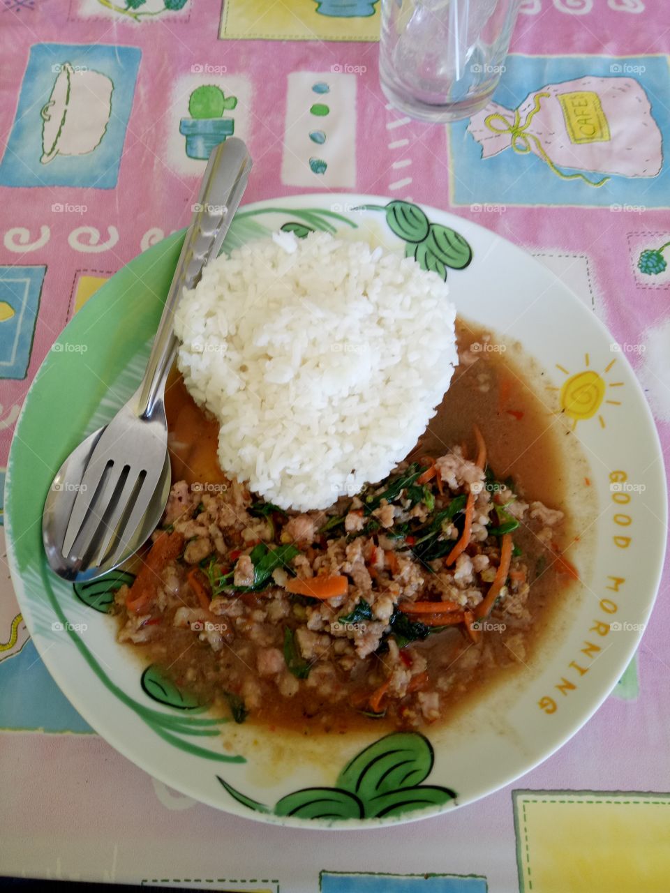 Thai food - Rice topped with stir-fried pork and basil