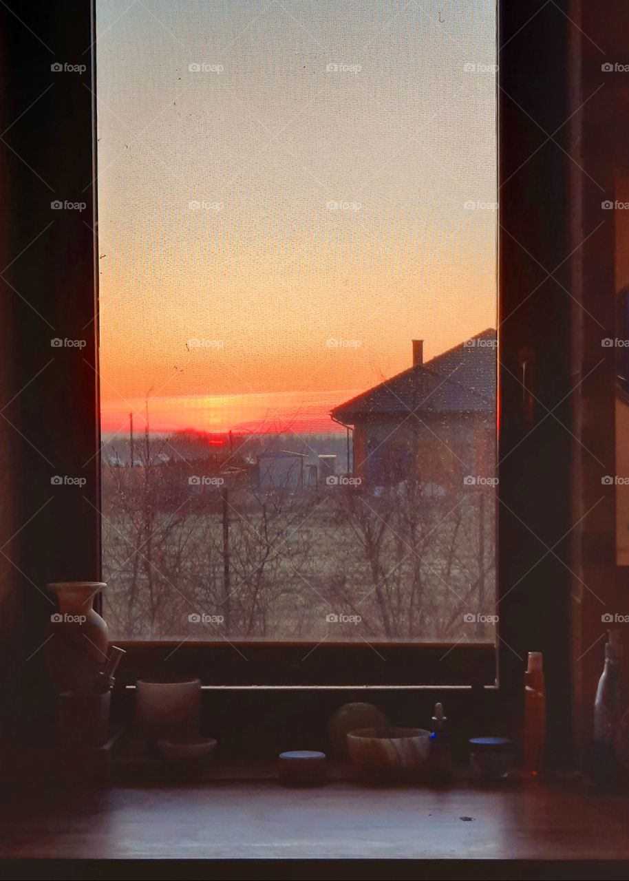 window vue of the moment of sunrise