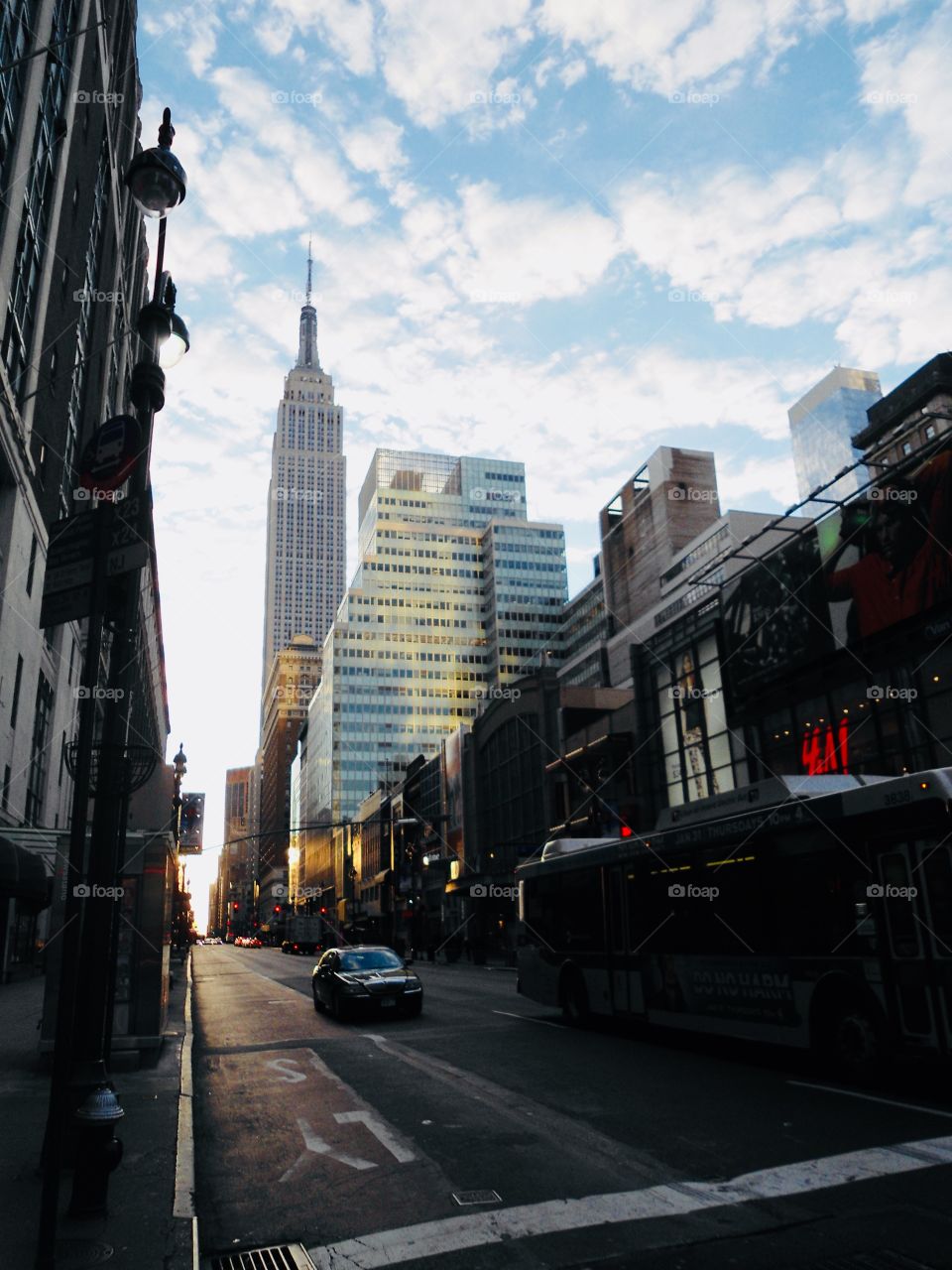 New york Street view to Empire State building in sunrise 