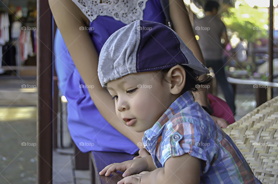 Portrait of a boy, Asian Age 2 years at the floating market.