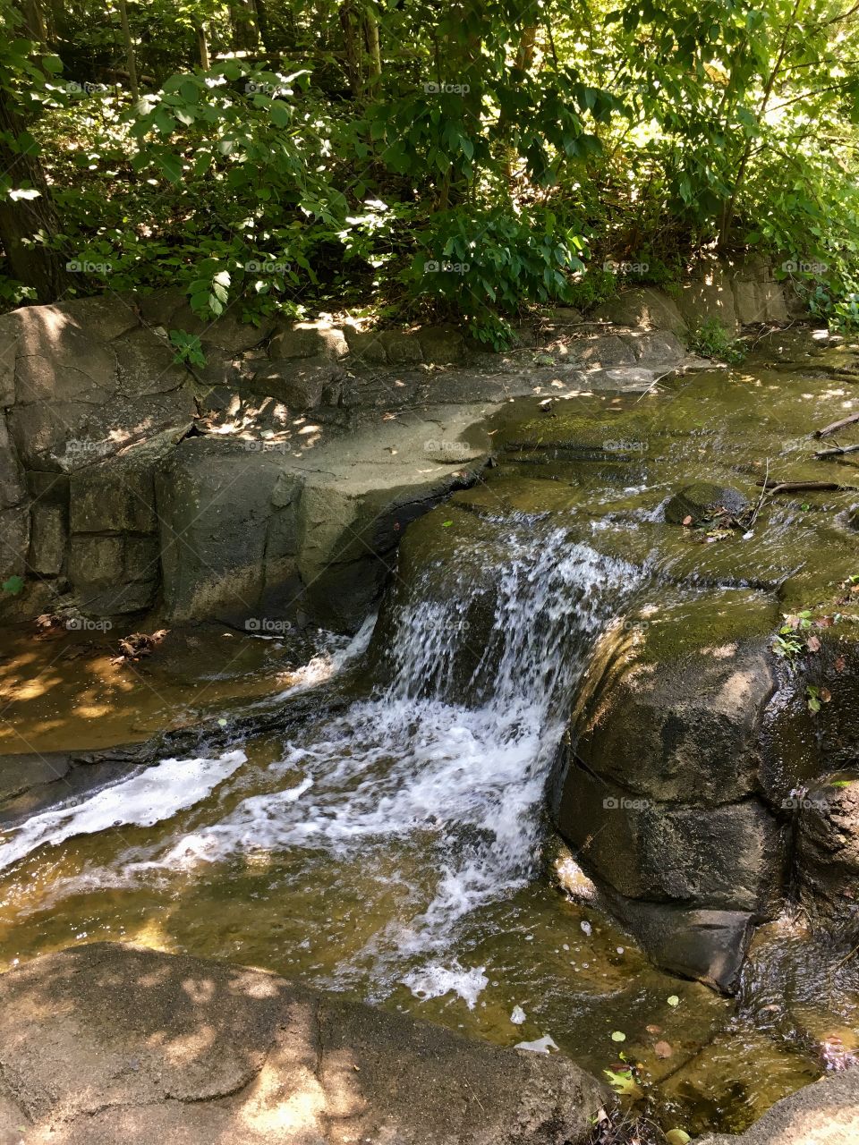 Refreshing water fall in park