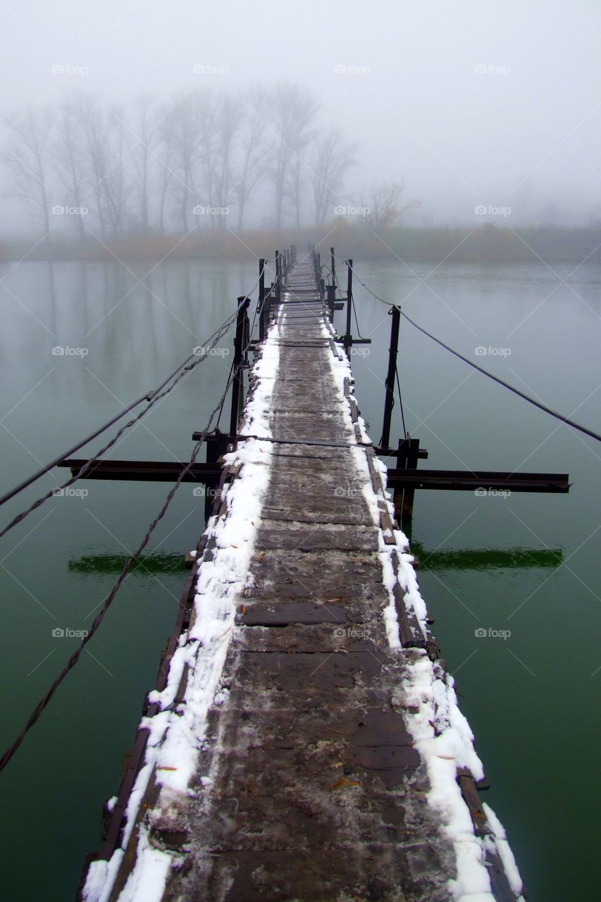 Wooden pier at lake