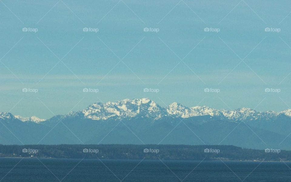 Snow capped mountain range