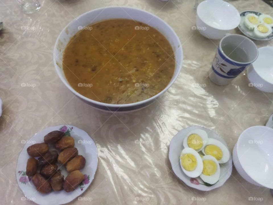 Moroccan table in Ramadan month:  Soup. Date and eggs.