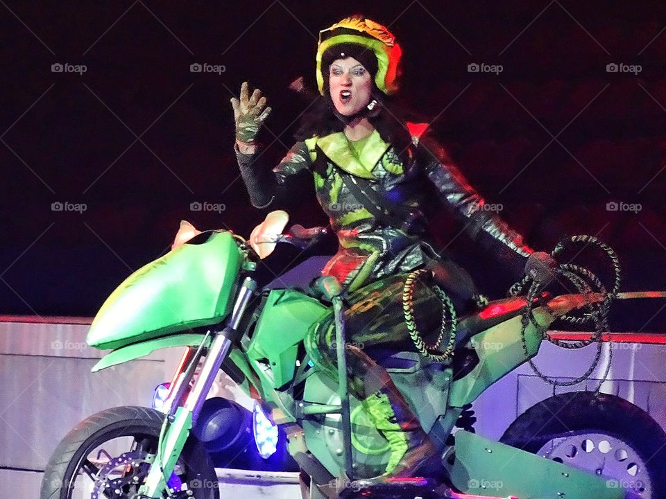 Girl Power. Powerful Woman Riding A Motorcycle
