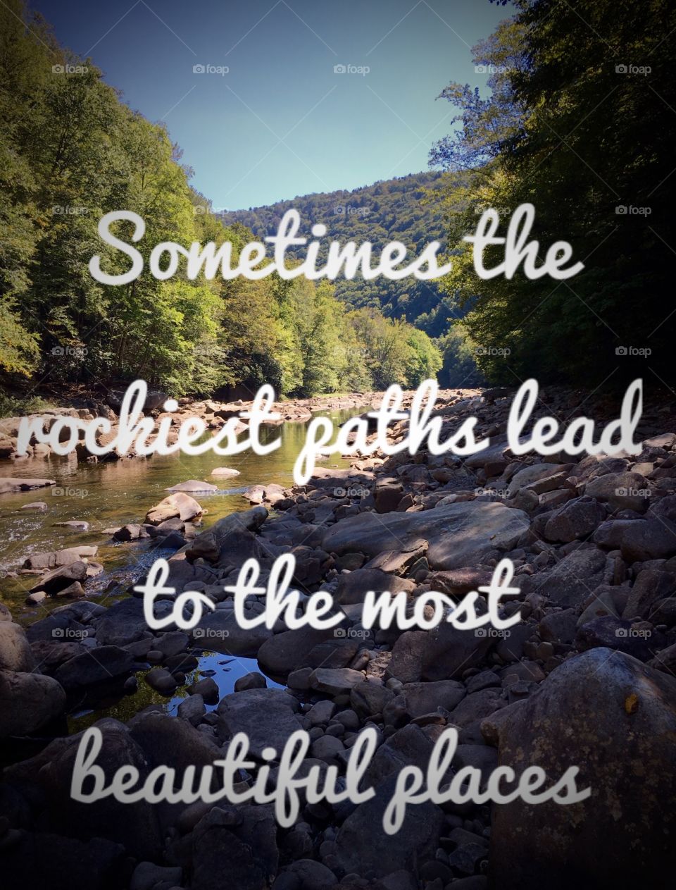 Rocky path to a stream in the mountains