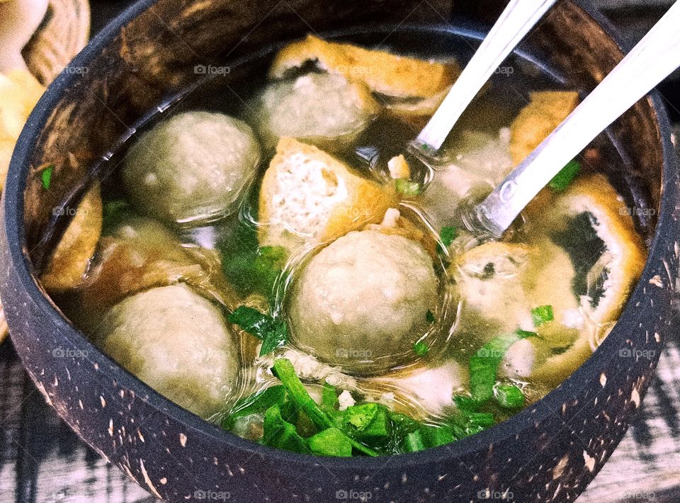 delicious meatballs in coconut shell