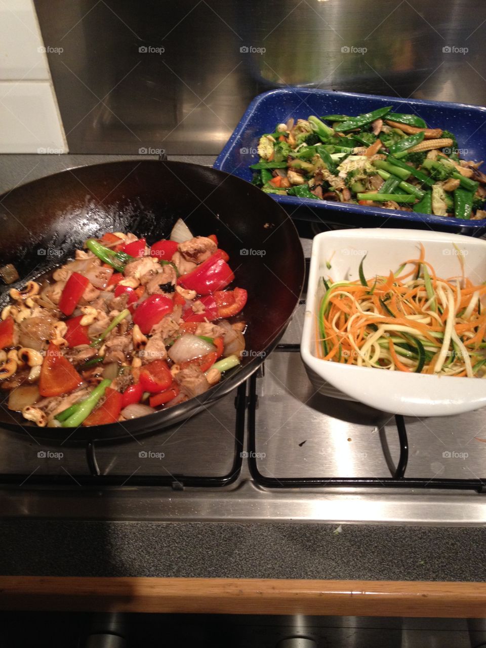 Chinese feast for one or two. 
Chicken and red pepper stirfry with cashews, Asian  style lemon and vegetable noodle salad, vegetable stirfry. 