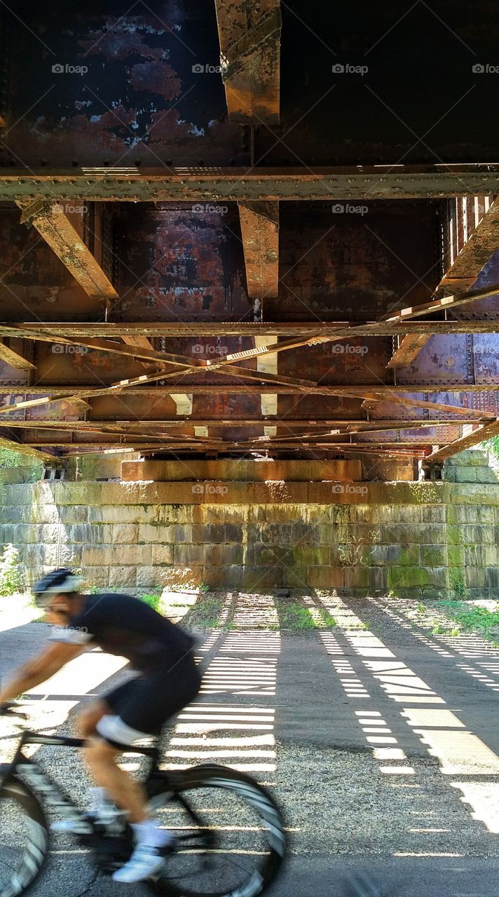 Bike Trail Underpass with bicyclist streaking by