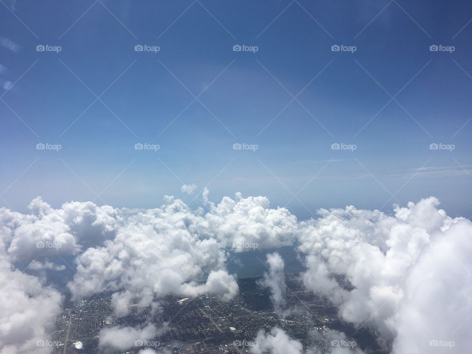 Jet blue cloud plane