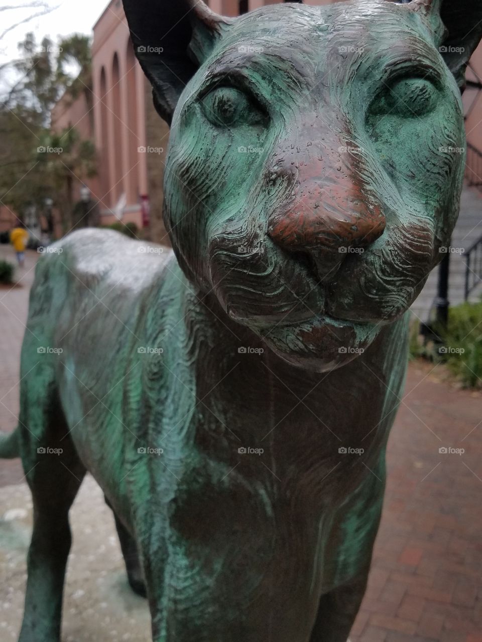rusty cougar statue