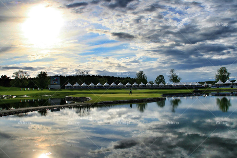 green sun water reflection by hyperr
