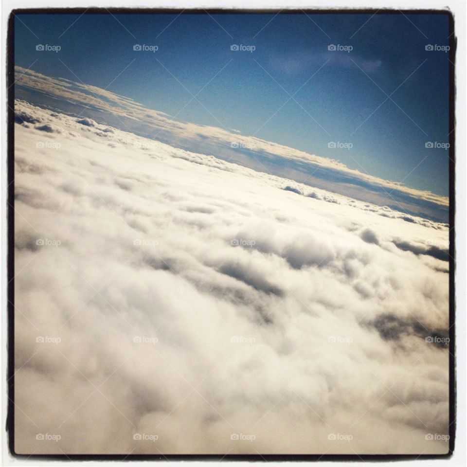 Above the Clouds. Picture taken from airplane window 